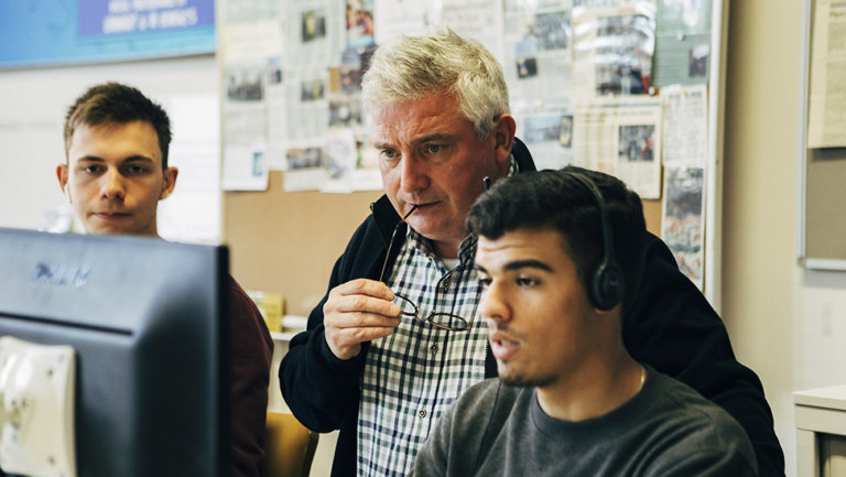 Diederik Roelandts met 2 leerlingen